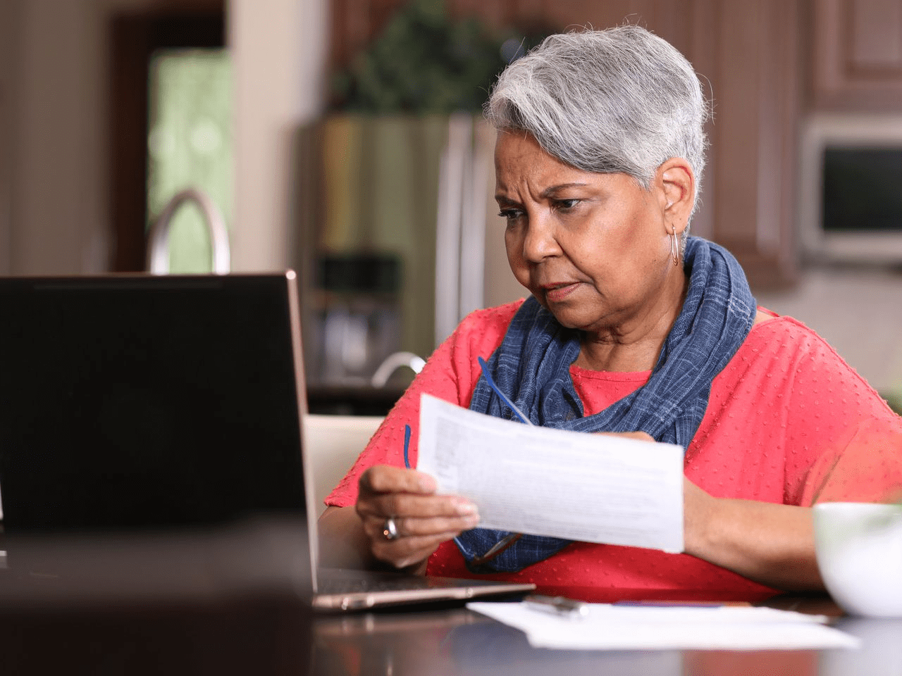 A person looking at a document related to Work Credits in Social Security Disability