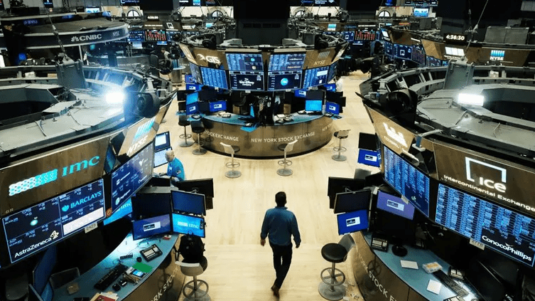 A stock exchange with traders buying and selling stocks