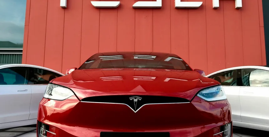 tesla vehicle and logo